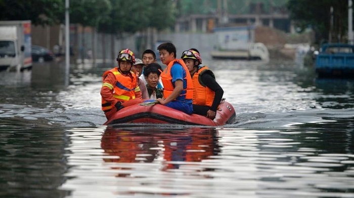 Fresh floods kill at least 25 across China, scores missing 
